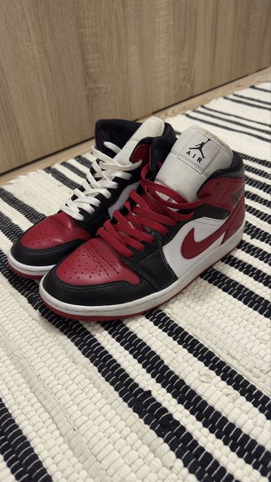 jordan 1 mid bred toe