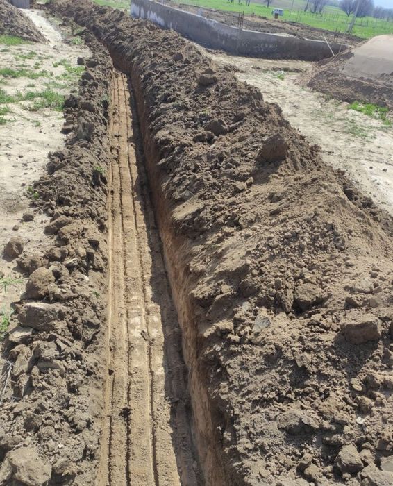 Услуга эксковатора-погрузчика