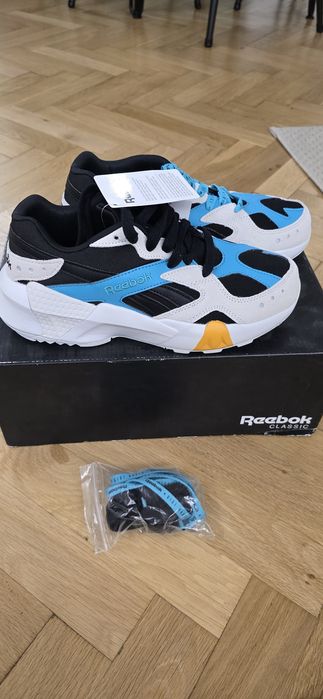 Adidasi Reebok x Gigi Hadid Aztrek Double 93
Black/ Blue/ Grey/ Gold