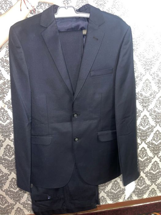 Новый костюм с брюками брендовые