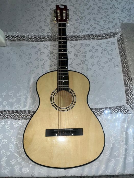 Гитара  кымбат емес