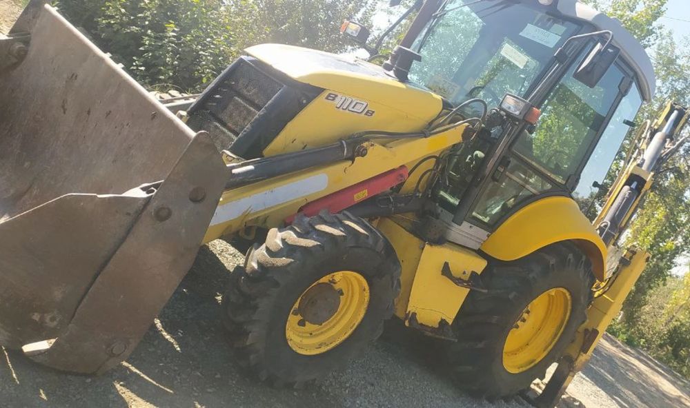 New holland 2009  расход йок ишга тайор   нархи 350 миллион келшамиз