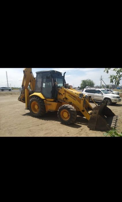 Услуги эксковатор-погрузчика 3в1