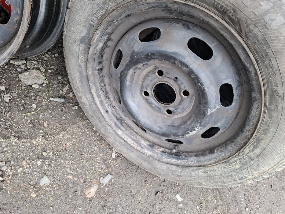 Vand 1 roata R 14 opel cu anvelopa 175 65 14 buna m+s