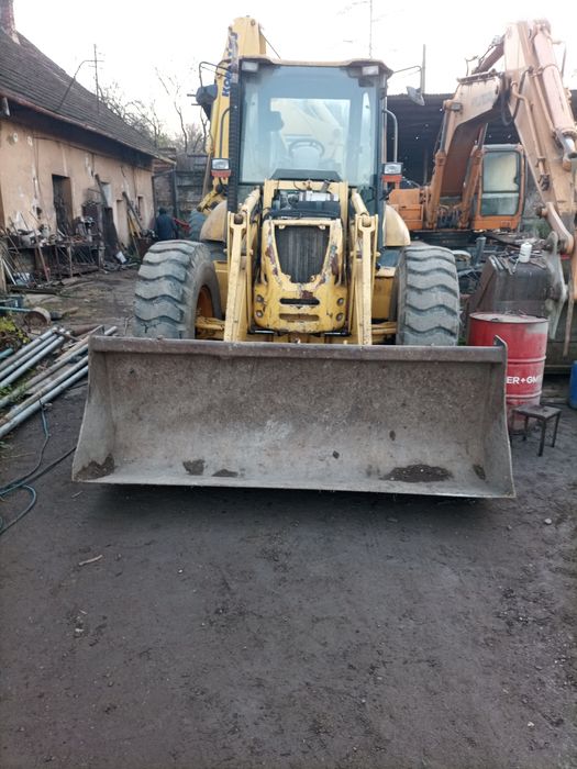 Buldoexcavator Komatsu