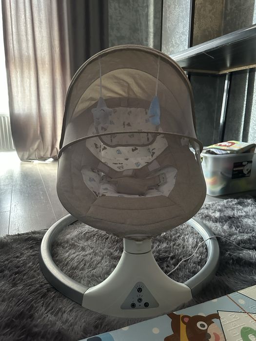 Электронная качалка до года