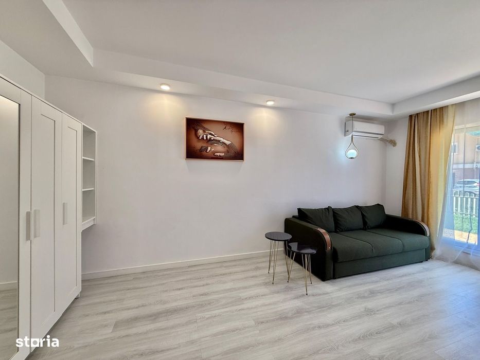 COSMOPOLIS - Apartament Tip studio cu 49 mp gradina,complet mobilat