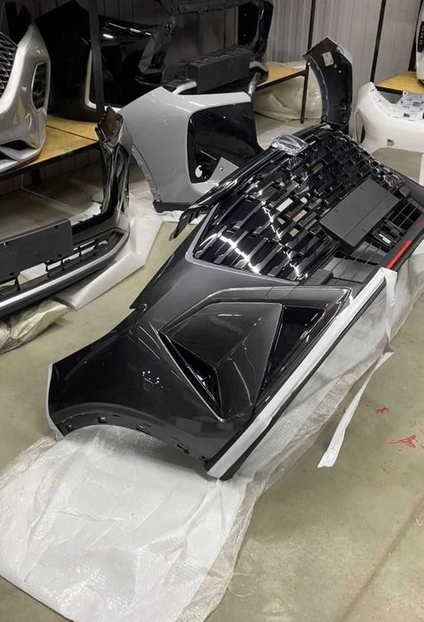 передний бампер оригинал