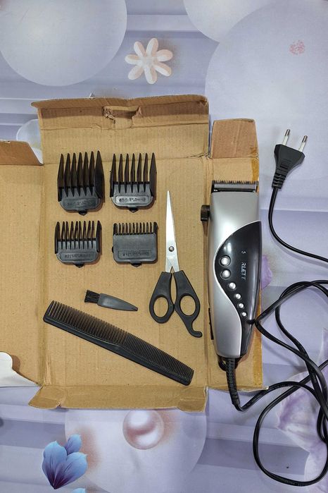 Машинка для стрижки волос.
