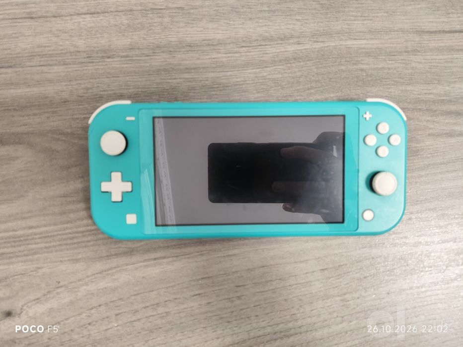 Nintendo Switch Lite (Turkuaz) holati yaxshi