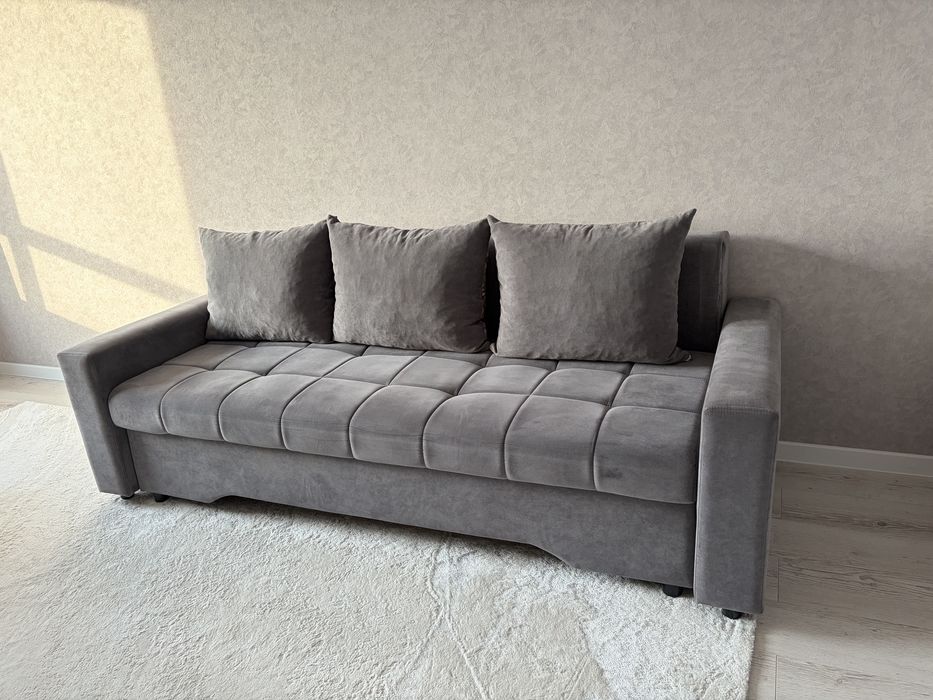 Продам диван коричневый 140см