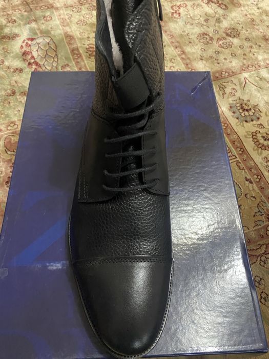 Продам новые мужские сапоги