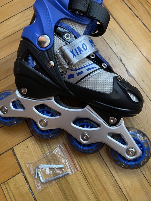 Роликовые коньки новые