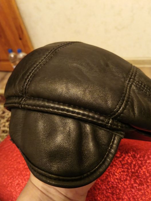 Кожаные шапки с мехом