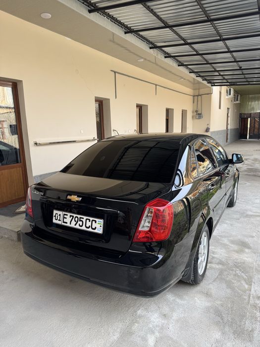 Gentra sotiladi 2023  qora 3 poz