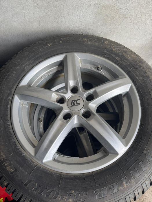 Set Dunlop cauciucuri iarna +jante  215/65 r16