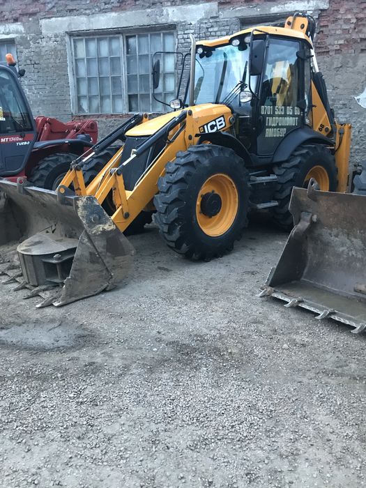 Эксковатор-погрузчик (ямобур, гидромолот)