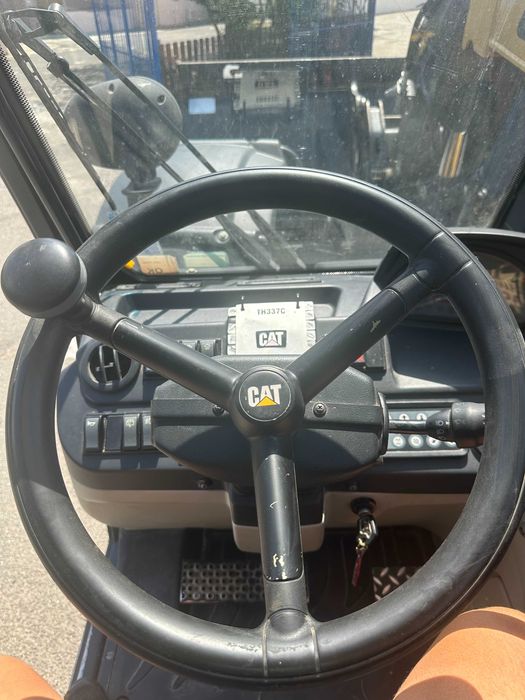 Телескопичен товарач Caterpillar TH337C