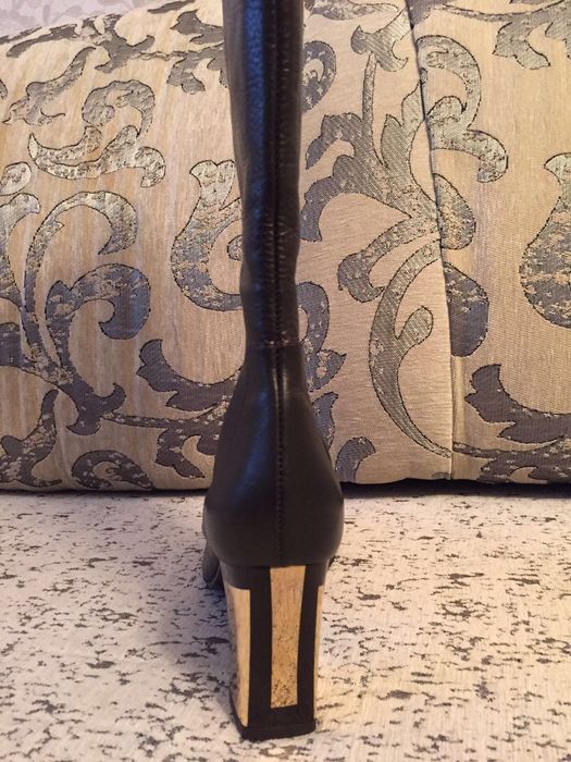 Женские сапоги..