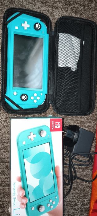 Продам Нинтендо свич лайт (прошитый)