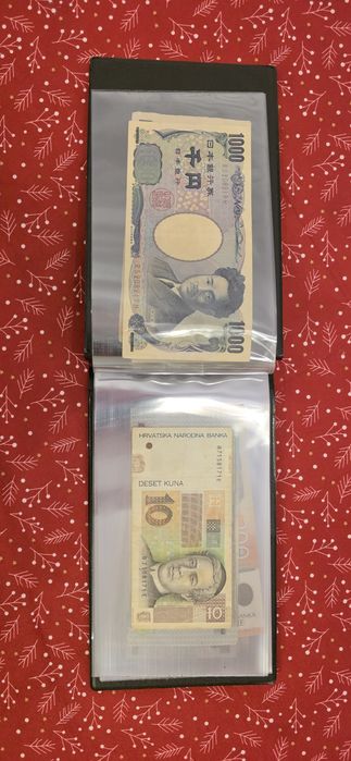 Vand album cu 20 bancnote.