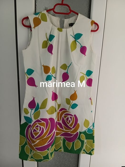 Vînd rochie animal print Mărime 2 XL