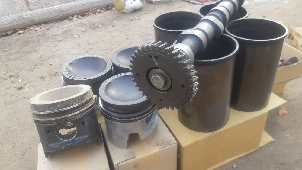 Isuzu zapchast raspiridval porshin gilza .10 tonna galovka qirishka