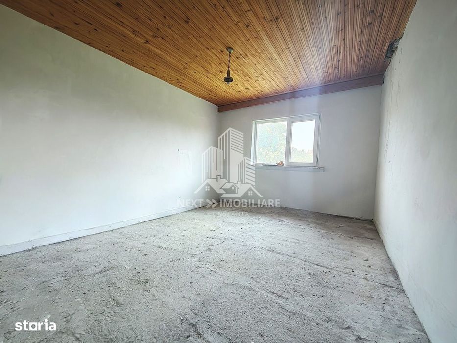 Casă P+1 cu 8 camere 492 mp teren 21 ml deschidere comision 0%
