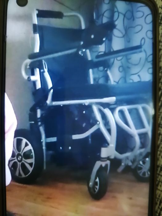 Инвалидная коляска с электроариводом