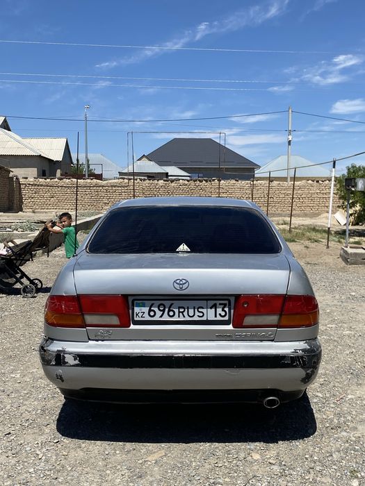 Tayota Carina E  Газ бензин