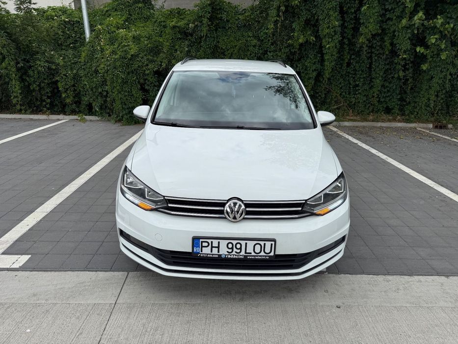 Volkswagen Touran Prim propietar cu verificare la reprezentanta km reali masina de Direc