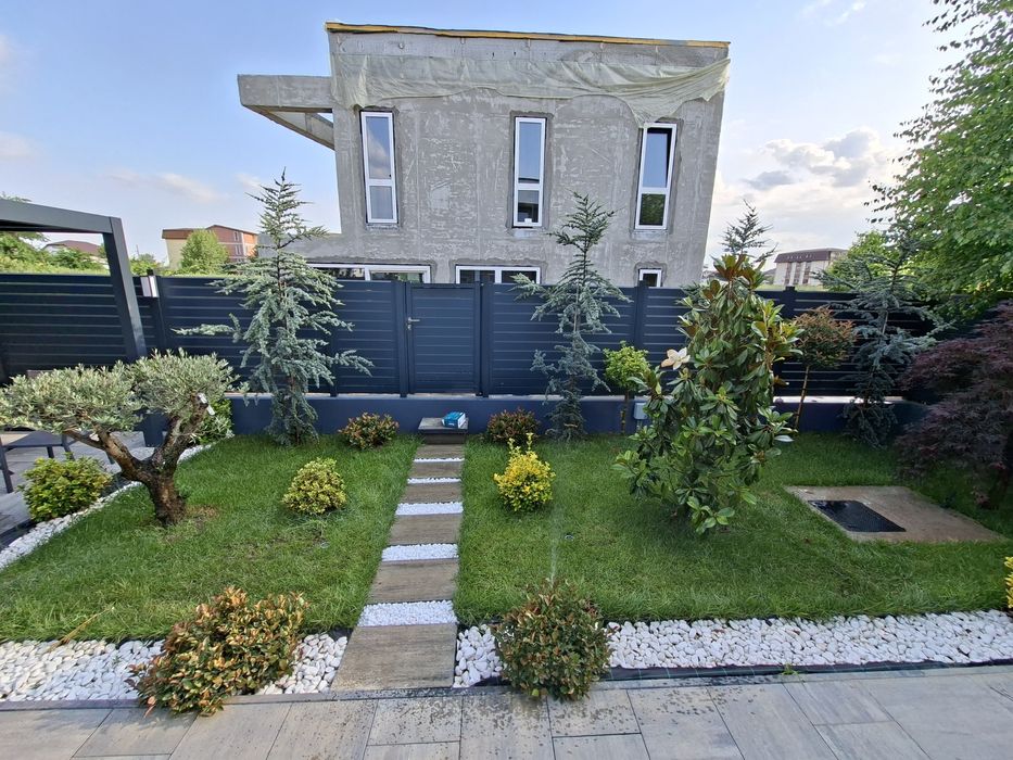 Amenajări grădini cu gazon si sistem de irigat