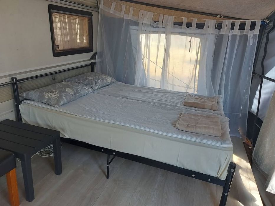 Каравани под наем "По полека..." градина Кайт