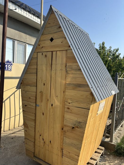 Таза агаштан жасалынган Туалет