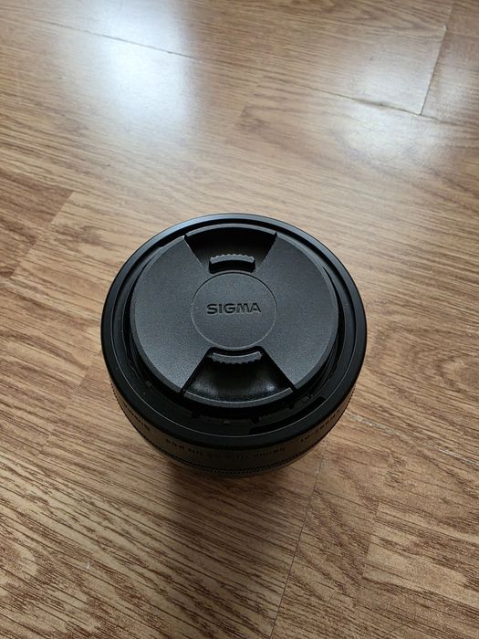 Sigma 56mm F1.4 Sony E-mount + филтър Walimex Pro Slim MC UV 55mm | Перфектно състояние