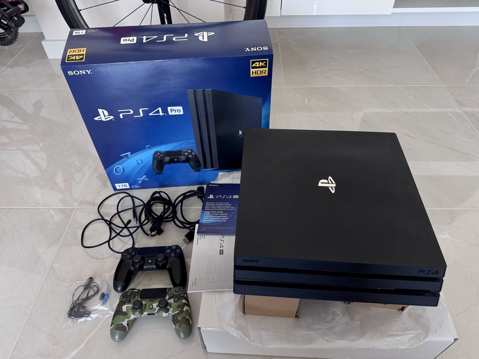 Playstation 4 Pro 1 TB SSD - пълен комплект + 9 игри