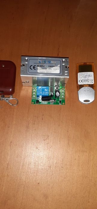 Mecanism pentru acționare electrică ușă garaj