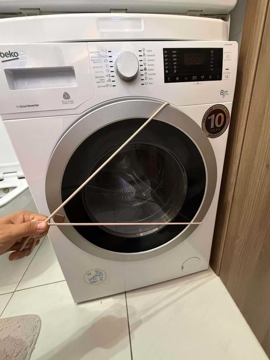 masina spalat si uscat rufe Beko