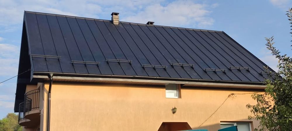 Montaj acoperis tigla metalica reparatii acoperisuri