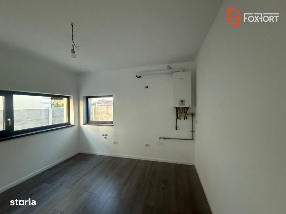 Duplex 5 camere 124 mp utili, despartit prin carport, Chisoda