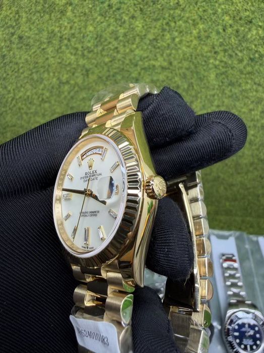 Часовник Rolex Day-Date 40 president 18k gold Baguette Diamond