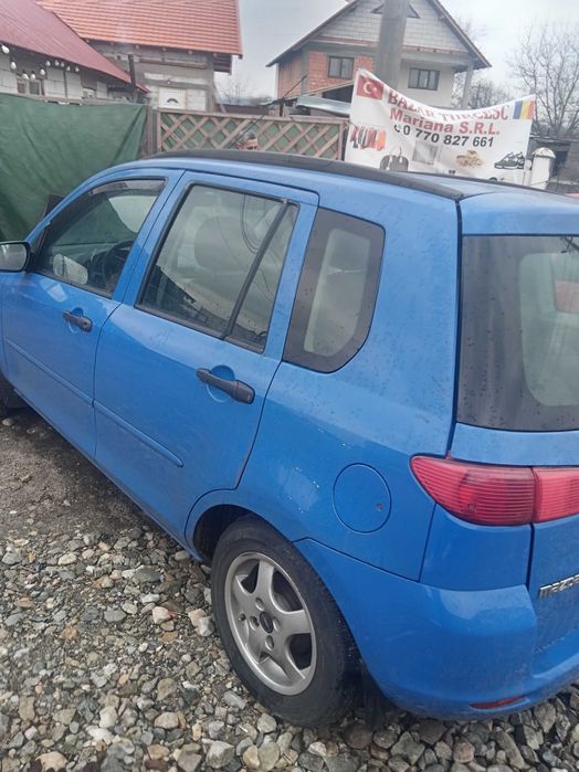 Vand mazda 2 capacitate motor 14