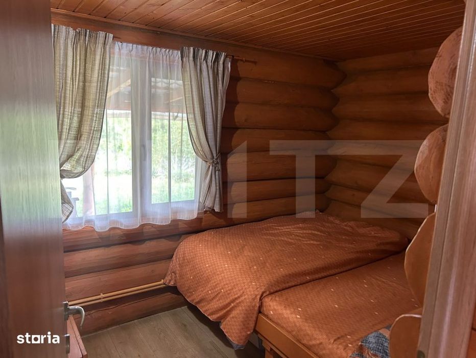 Cabana din busteni - refugiu ideal in mijlocul naturii
