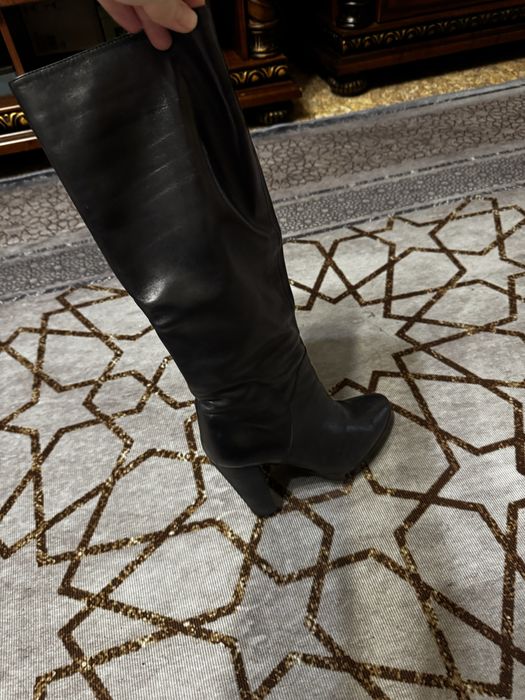 Продам женскте сапоги