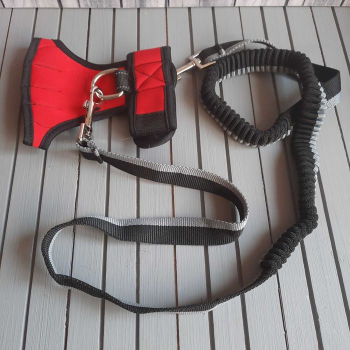 Поводок с потягом для собак в отличном состоянии.