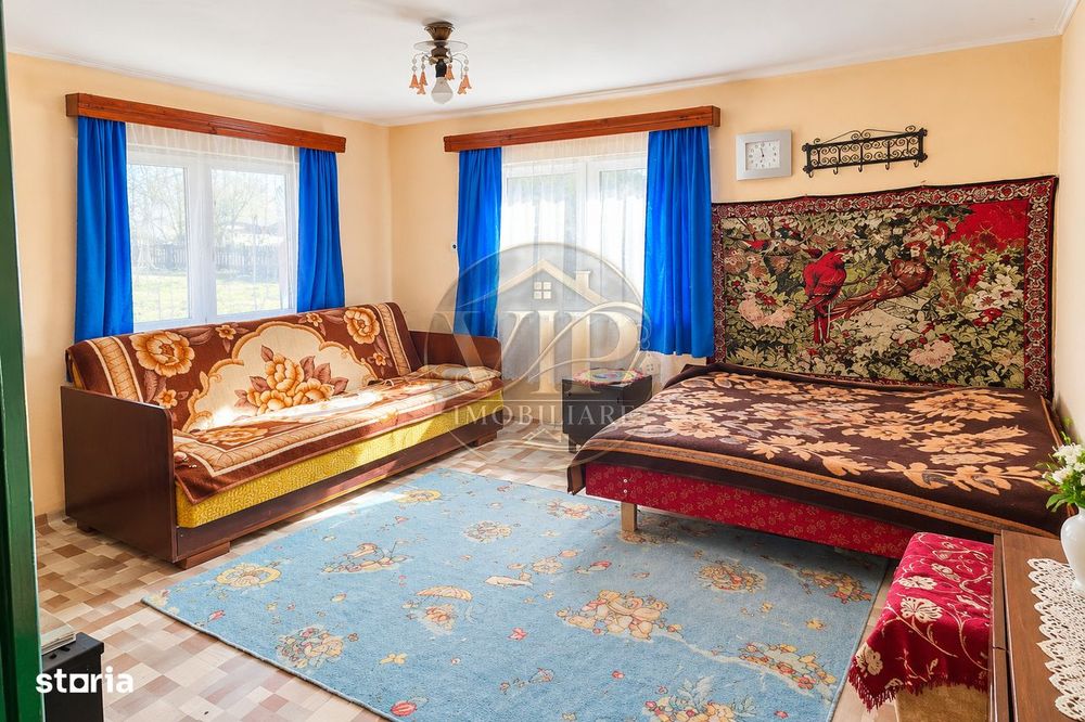 Casa individuala cu 4 camere,1130 mp teren,Intregalde