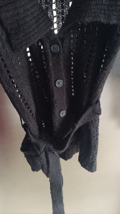 Черна жилетка, Sisley