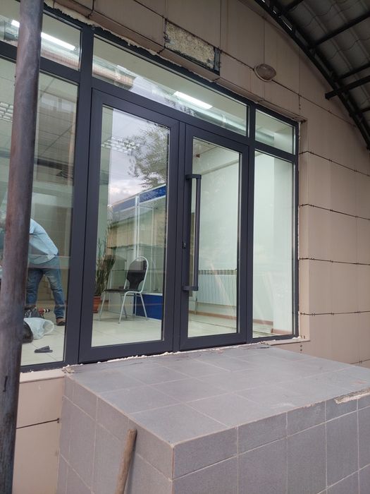 Алюминевые окна двери и витражи