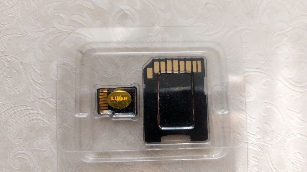 Продаю карту памяти с адаптером