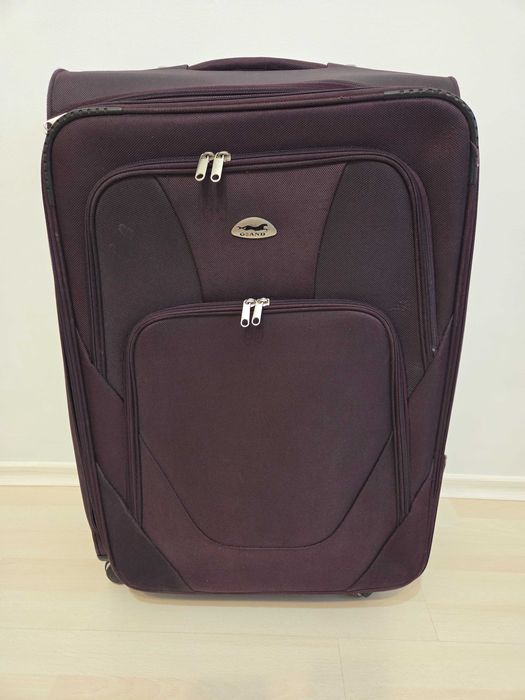 Голям куфар в лилав цвят